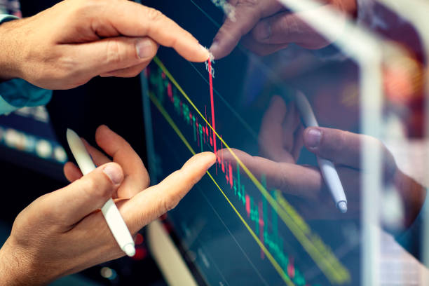istock Online financial analysis on a computer monitor. 1175198288