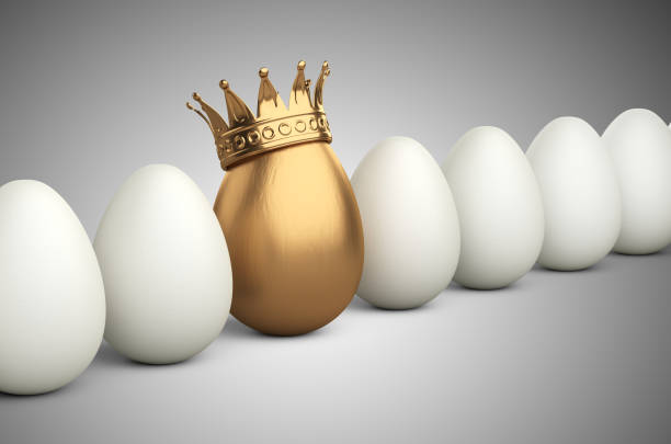 istock White egg row with one in the golden crown. Leadership concept. 1175201929