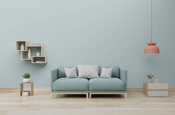 istock Modern living room interior with sofa and green plants,lamp,table on blue wall background. 1175203373
