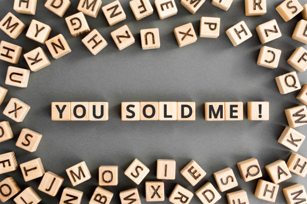istock You sold me - phrase from wooden blocks with letters 1175203554
