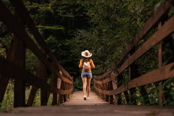 istock Unrecognizable woman on the woods 1175203575