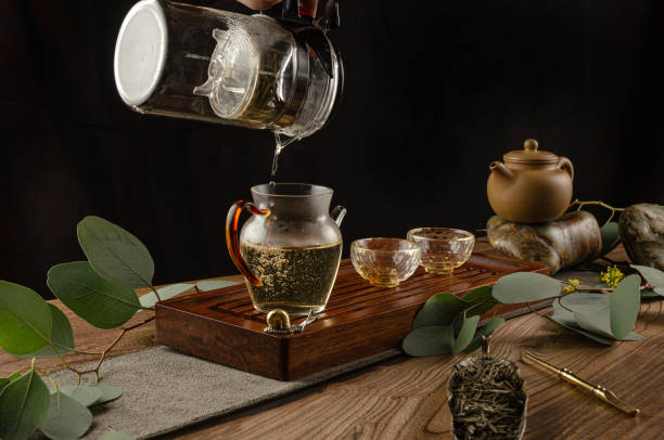 istock tea table with instruments teapots cups and tea Shen Puer 1175203798