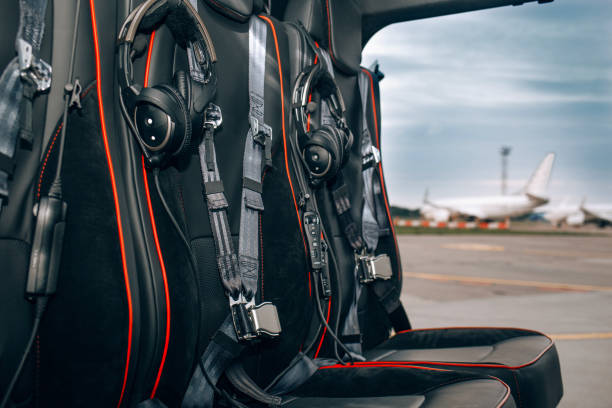 Helicopter passenger leather seats. Interior of luxury helicopter Helicopter passenger leather seats. Interior of luxury helicopter helicopter seat stock pictures, royalty-free photos & images