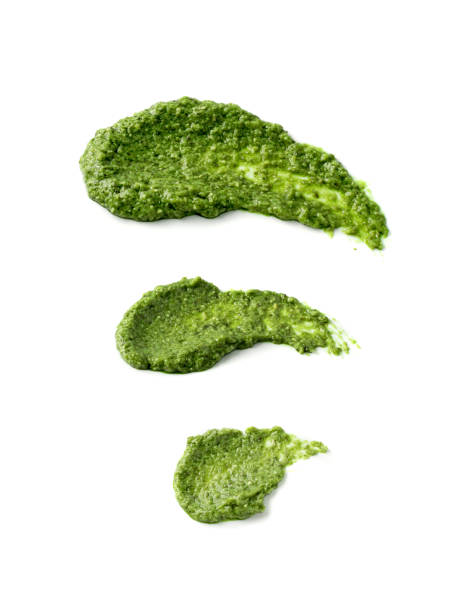 Pesto sauce spread or blob isolated on white background