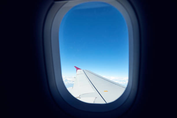 istock Airplane wing as seen from the passenger's seat. 1175205722