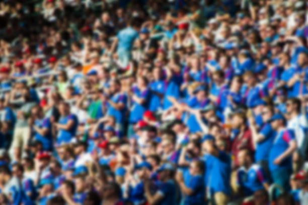istock Blurred crowd of spectators on a stadium 1175205737