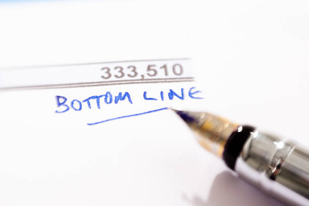 istock Fountain pen over financial figures marked 