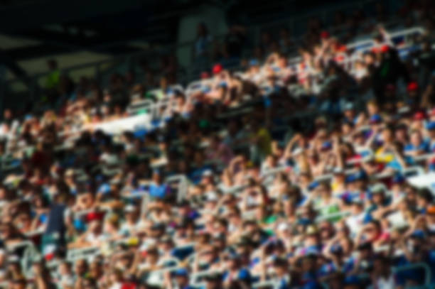 istock Blurred crowd of spectators on a stadium 1175206921