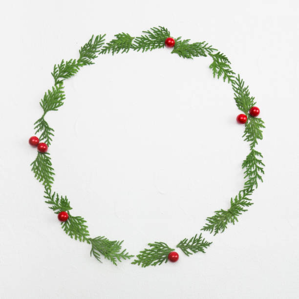 istock Creative and minimal Christmas layout. Christmas wreath on white background with copy space. 1175208331