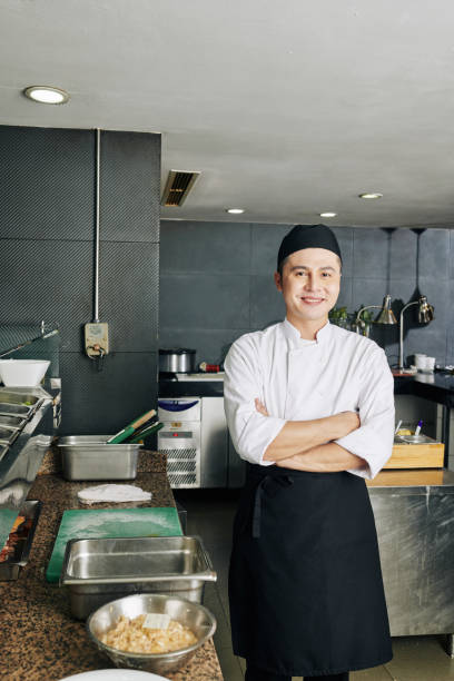 istock Asian cook in the restaurant 1175211462