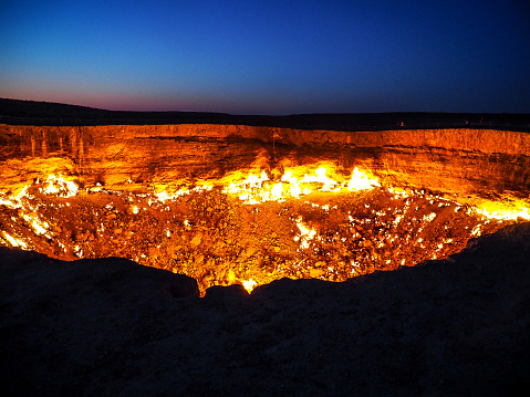 Also known as the door to hell, the burning crater is a natural gas field that collapsed. Workers set it on fire in 1971 hoping it would burn out the methane gas but has been burning ever since.