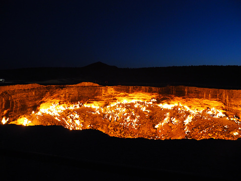 Also known as the door to hell, the burning crater is a natural gas field that collapsed. Workers set it on fire in 1971 hoping it would burn out the methane gas but has been burning ever since.