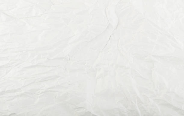 istock Sheet of White Thin Crumpled Craft Paper Background 1175218771