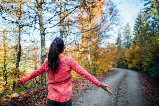 istock Young woman relaxing in nature 1175224912