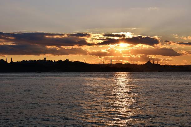 istock Istanbul sunset and sun with mosque 1175225250