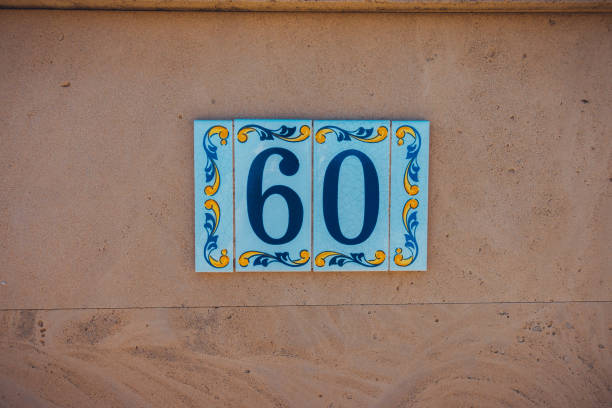 istock number 60 door sign in historical style 1175226119