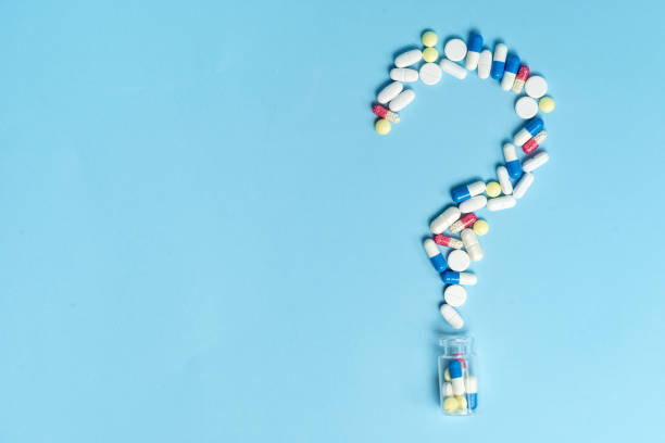 Studio shot of medical pills on blue background