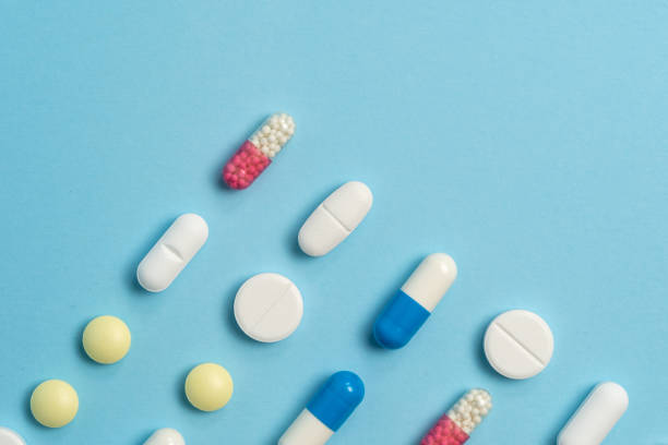 istock Studio shot of medical pills on blue background 1175227667