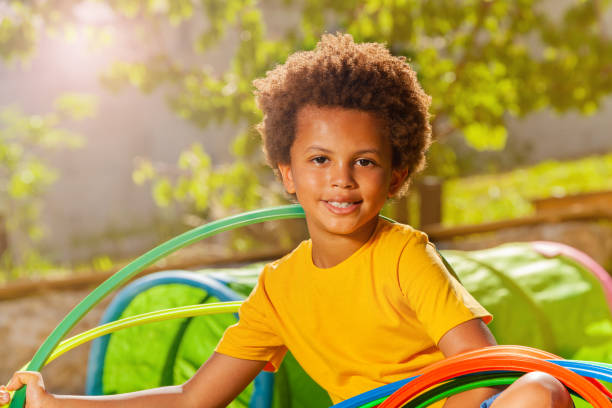 istock Happy curly black boy portrait on playground 1175228875