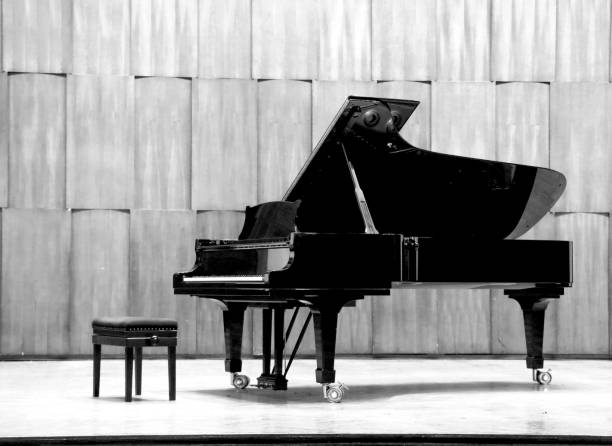 istock Grand piano set on stage, B&W 1175229552