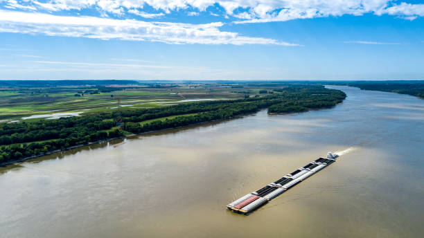 Mississippi River Barge from Drone Barge on the Mississippi River captured from drone mississippi river stock pictures, royalty-free photos & images