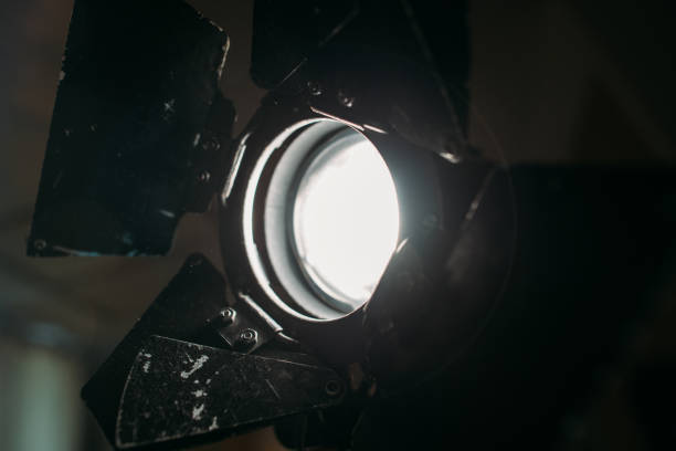 istock Spotlight with directional light with a Fresnel lens, halogen lamp and protective shutters. 1175237432