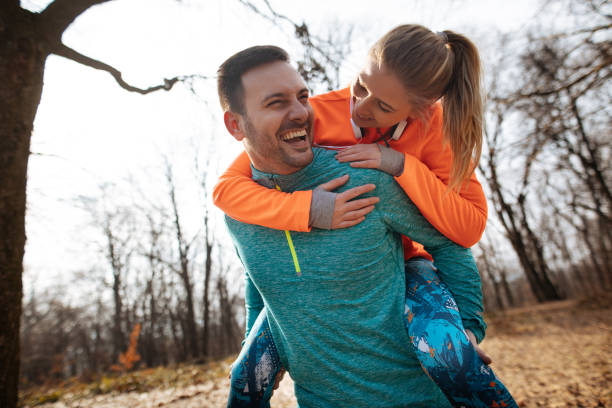 istock Boyfriend giving piggyback ride to girlfriend 1175238821