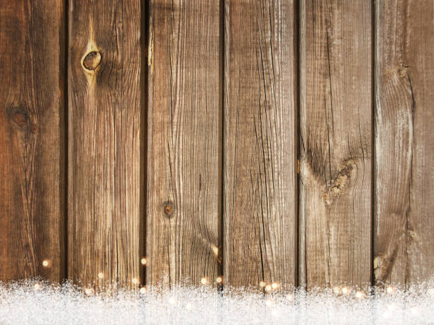 istock Christmas wood background with snow 1175239408