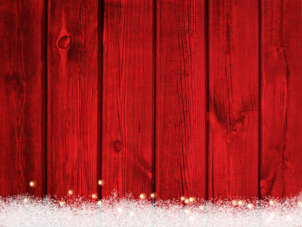 istock Wooden red christmas background with snow and light 1175239661