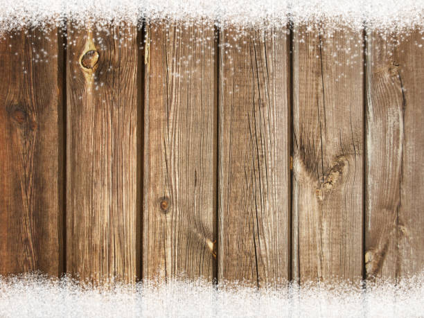 istock Old wood texture with snow - Christmas winter background 1175244964