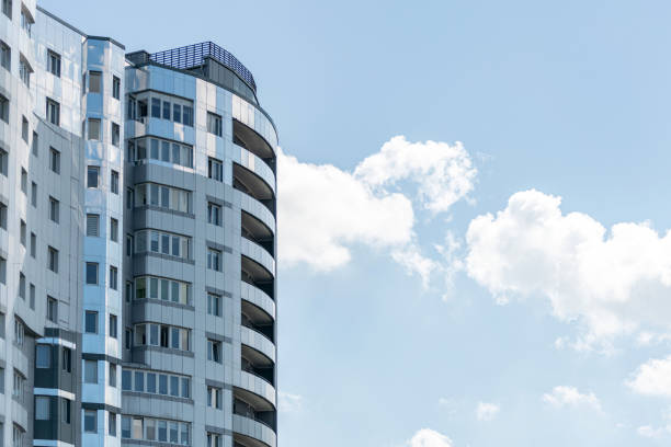 istock Modern high-rise building, copy space. Luxury multi storey skyscraper with flats and apartments for housing. 1175247115