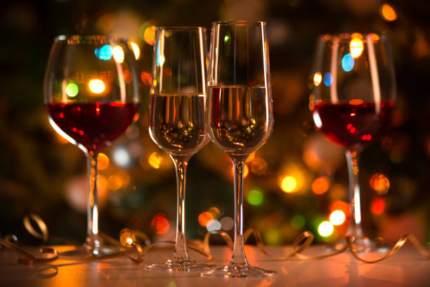 istock Champagne glasses and Christmas lights 1175247130