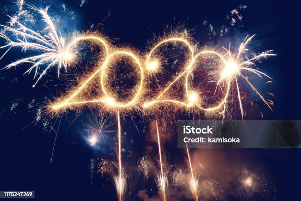 Sparkler Happy New Year 2020 With Fireworks Stock Photo - Download Image Now - 2020, New Year's Eve, New Year