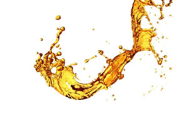 istock engine oil splashing isolated on white background. 1175247731