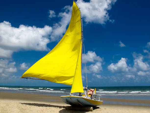 Sailing boat at genipabu beach in Extremoz, Natal, Rio Grande do Norte - Tourism and destinations in Northeast Brazil - Tourist attraction, travel guide for Brazil