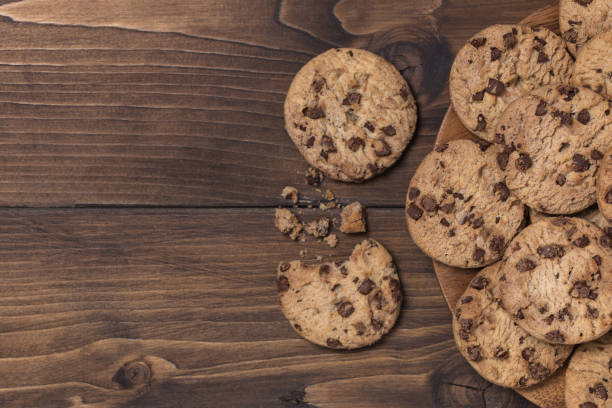 istock Chock chip cookie on wooden table with copy space 1175249165