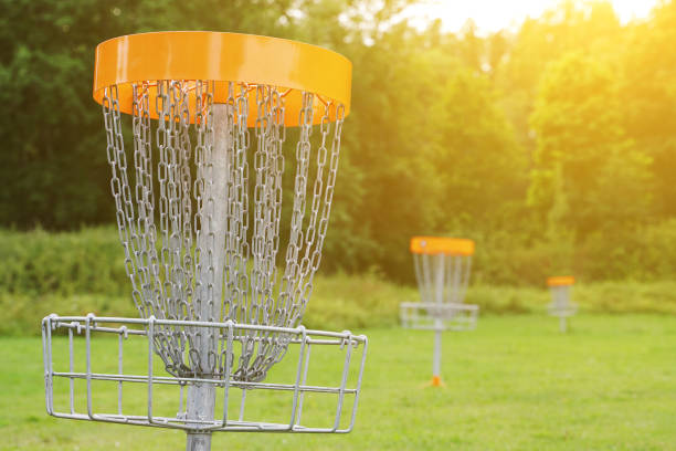 istock Disc golf basket in the park. 1175251132