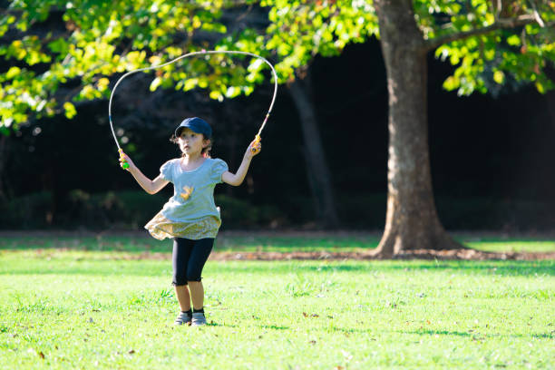 istock Girl playing with a jump rope 1175252002