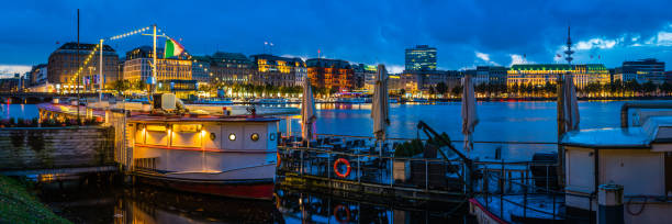 istock Hamburg Binnenalster waterfront restaurants hotels illuminated night panorama Germany 1175252013