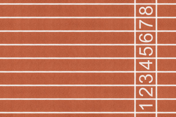 istock Athlete running track with white lane 1175255408