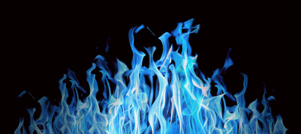 istock blue sparks of bright large fire on black 1175260866