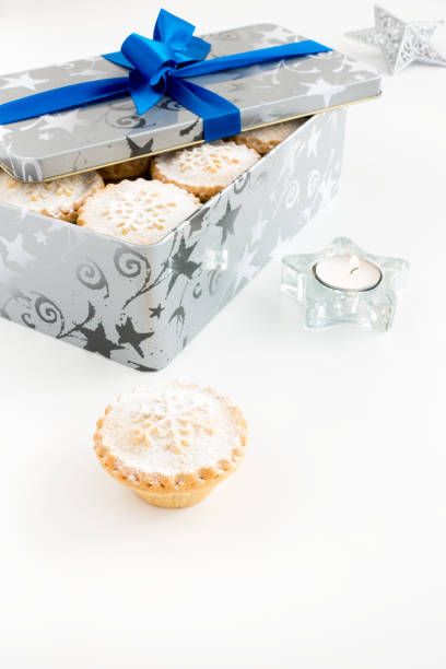 istock Mince Pies in Cookie Tin and on White Background 1175261259