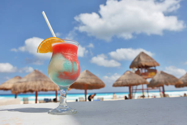 istock Close up of a Cocktail on a tropical beach 1175263079
