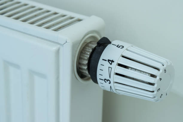 istock Heat regulator on a heater, close up picture. Heating Costs. 1175265220