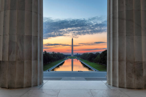 istock Lincoln Memorial at sunrise and Washington Monument 1175265340