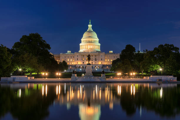 US Capitol Building at night stock photo