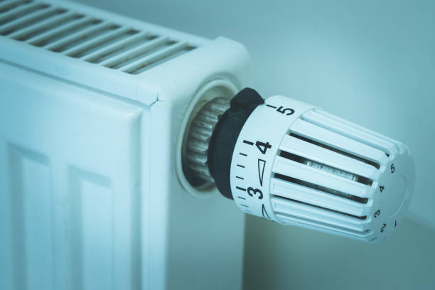 istock Heat regulator on a heater, close up picture. Heating Costs. 1175265455