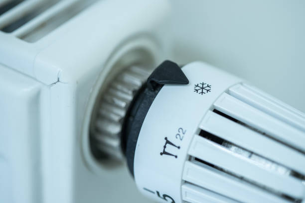 istock Heat regulator on a heater, close up picture. Heating Costs. 1175266434