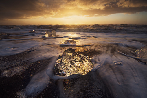 Landscape photography on diamond beach in Iceland at sunrise.