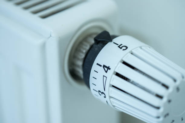 istock Heat regulator on a heater, close up picture. Heating Costs. 1175266762